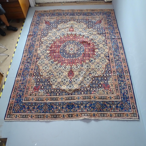 2343 - A blue-ground Mood carpet. 305x226cm