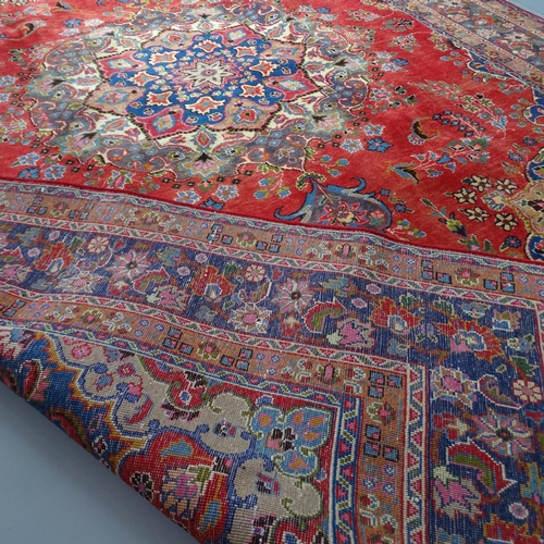 2347 - A red-ground Meshed carpet. 330x240cm.