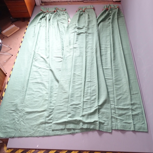 2355 - A pair of green cotton lined curtains. Drop 335cm, width (top) 130cm, (base) 320cm, and a matching s... 