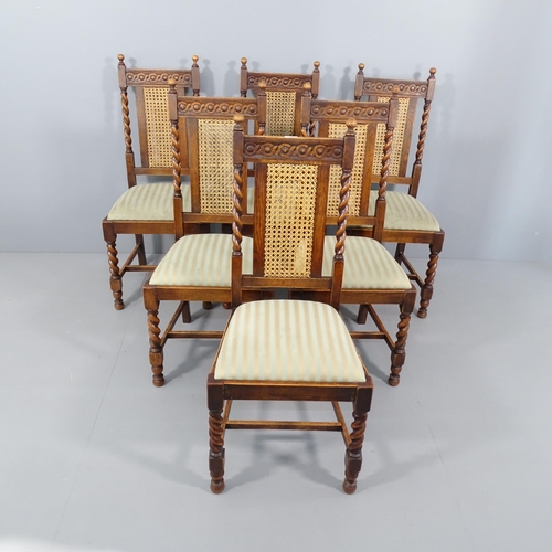 2295 - A set of six 1920s oak cane back dining chairs with barley twist legs.