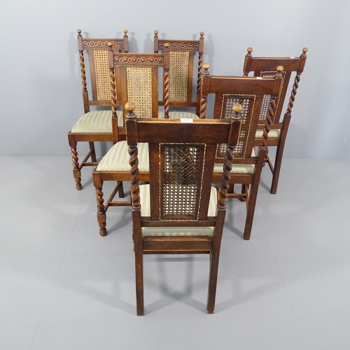 2295 - A set of six 1920s oak cane back dining chairs with barley twist legs.