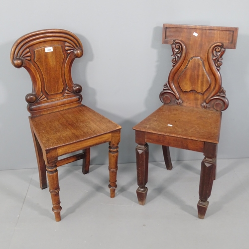 2298 - Two 19th century mahogany shield back hall chairs.