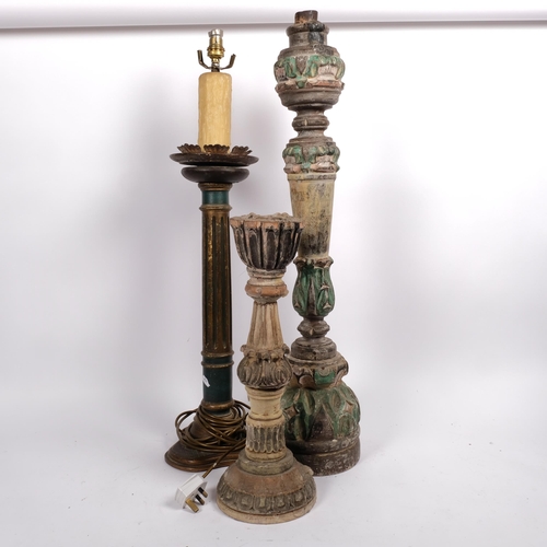 525 - A painted and gilded table lamp, H77cm overall, and 2 Vintage carved and painted wood candlesticks