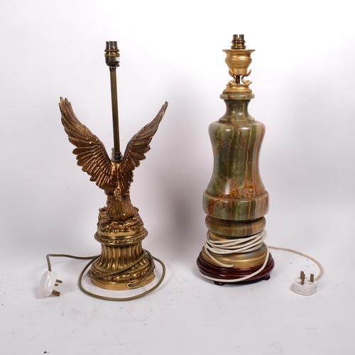 531 - A brass eagle figure table lamp, 52cm, and an Oriental turned onyx table lamp on separate stand