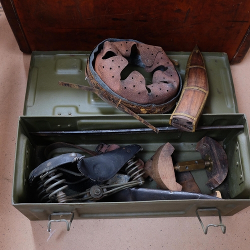 559 - An ammo box, with bike saddle, knife in sheath, and a suitcase