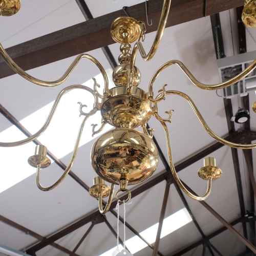 579 - A modern brass 8-branch Dutch style chandelier, 69cm across