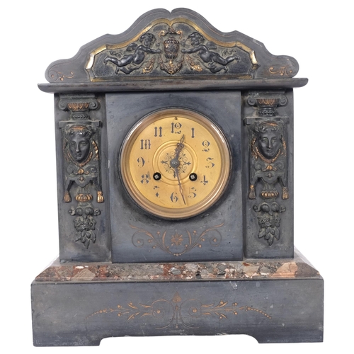 592 - A slate and marble-cased mantel clock, with mask decoration, H34cm