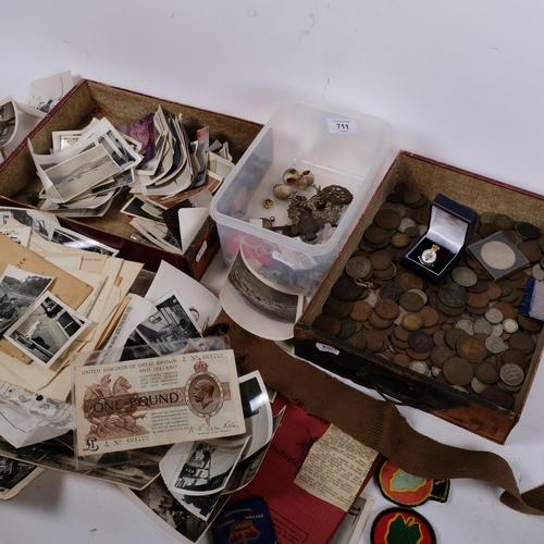 711 - A quantity of photographs, postcards and associated ephemera, some war and service related in nature... 