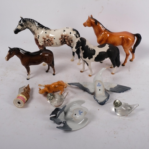 722 - A quantity of Beswick ceramic horses, a Lladro nesting crane, a Lladro landing crane, a Beswick Beat... 