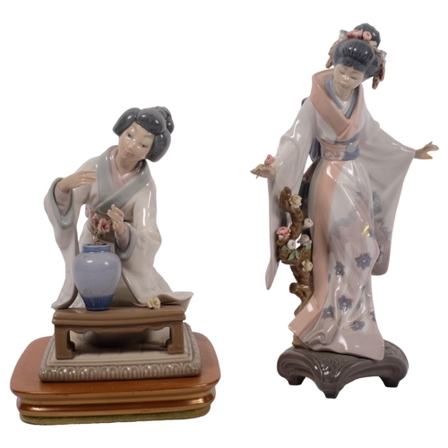 723 - LLADRO - a Lladro Geisha porcelain figurine, standing with flowers, and a second Oriental flower arr... 