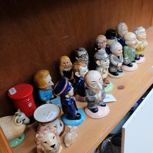 738 - A collection of novelty salt and pepper pots, including political figures, tallest Edward Heath 11cm