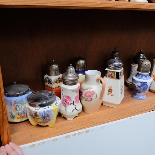 743 - A shelf of Vintage sugar casters, including Coalport and Carlton Ware, 2 preserve pots, and a Dartmo... 