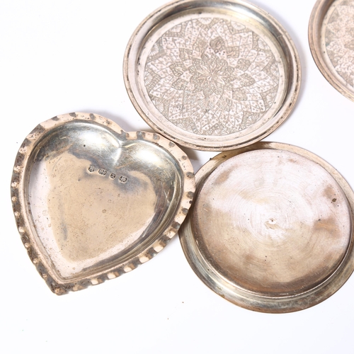 1001 - A pair of silver heart-shaped pin dishes, together with a set of 4 Persian white metal coasters