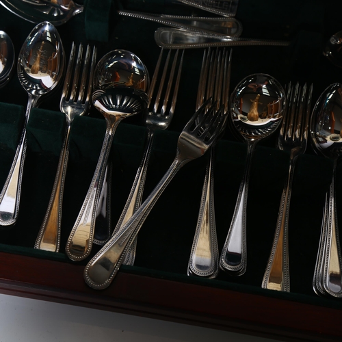 914 - JONELLE - canteen of stainless cutlery for 6 people, with bead edge, cased, and a Victorian blue and... 