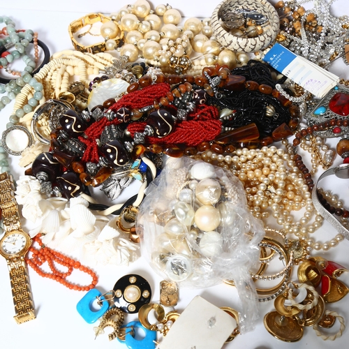 934 - A large quantity of various costume beads, necklaces, including agates, pearl necklace, amber etc