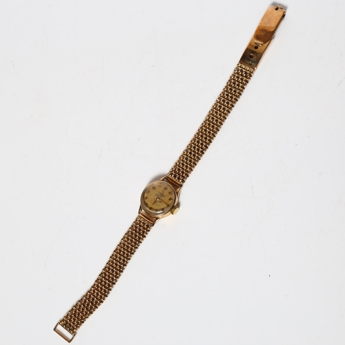 952 - OMEGA - a lady's Omega 9ct gold cased mechanical wristwatch, with a gold plated woven strap