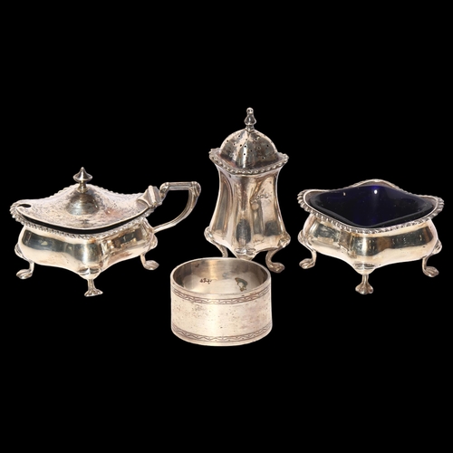 971 - A George V silver 3-piece cruet set, with cast gadrooned edge on paw feet, with blue glass liners, 7... 