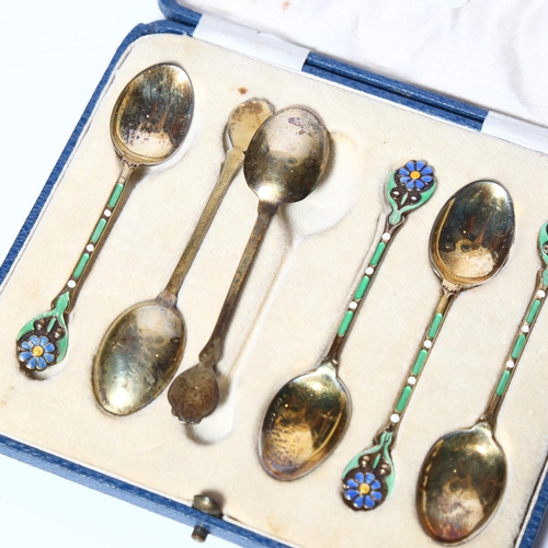 973 - A set of 6 George V silver-gilt and guilloche enamelled coffee spoons, in fitted case, hallmarks for... 