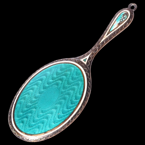 991 - A small silver plated and turquoise enamelled doll's hand mirror, L8.5cm