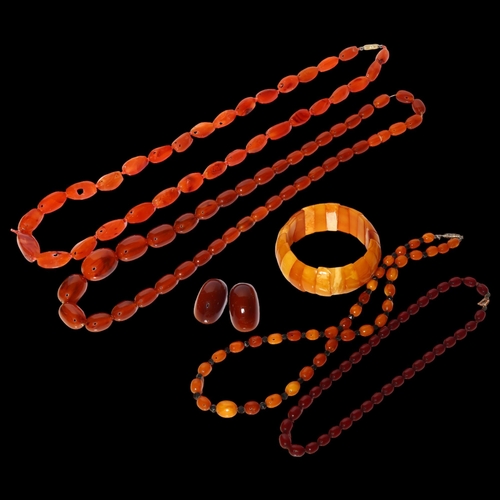 994 - A cherry Bakelite bead necklace, a carnelian bead necklace, and other Bakelite necklace etc