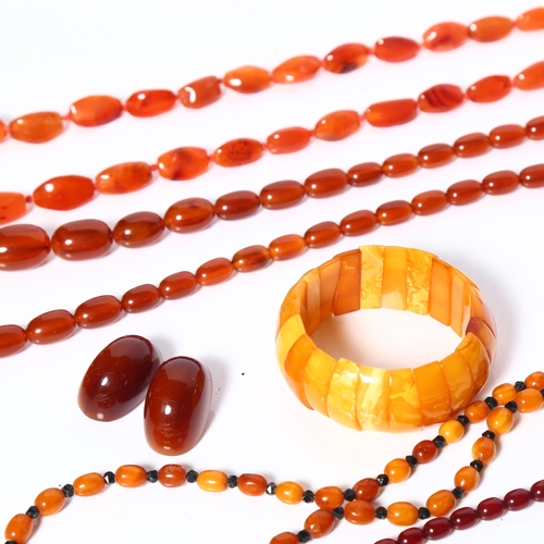 994 - A cherry Bakelite bead necklace, a carnelian bead necklace, and other Bakelite necklace etc