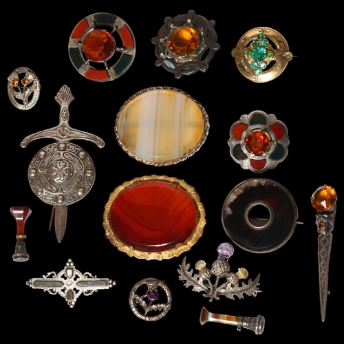 996 - A silver and hardstone set Scottish design brooch, a similar smaller brooch, a silver dirk design br... 