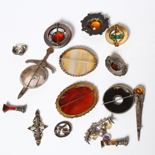 996 - A silver and hardstone set Scottish design brooch, a similar smaller brooch, a silver dirk design br... 