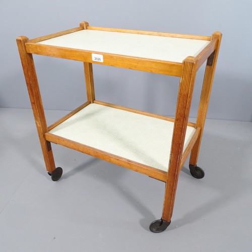 2026 - A mid-century two-tier teak drinks trolley with formica tops. 61x70x38cm.