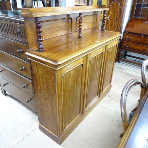 2171 - A Victorian mahogany chiffonier with 3 cupboard doors and raised back supported by three barley twis... 