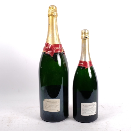 662 - An empty Bollinger magnum Champagne bottle, and another