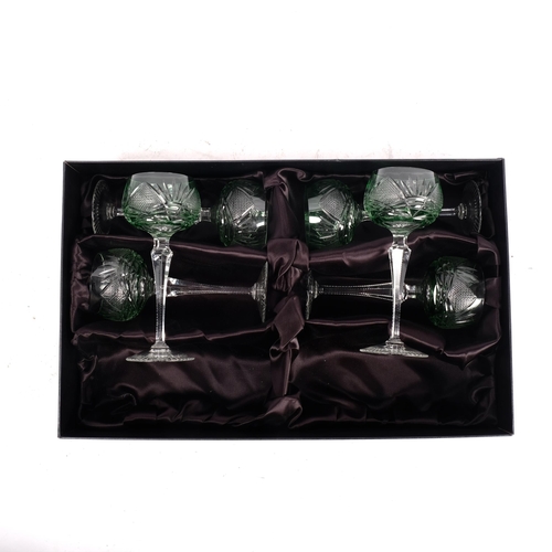 663 - A boxed set of 6 Thomas Webb crystal Hock glasses, with green overlay patterned bowls, H19cm