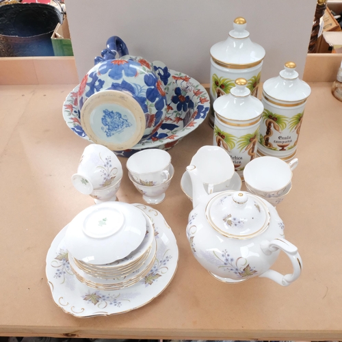 677 - Bone china tea service including teapot, a reproduction Imari style wash jug and basin, and a set of... 