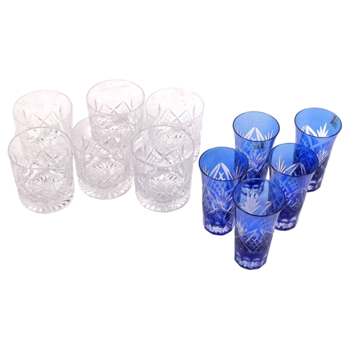 679 - A set of 6 cut-crystal Whisky tumblers, and a set of 5 blue overlay cut-glass beakers