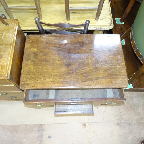 2064 - A George II oak kneehole writing desk, circa 1750, with 8 drawers and cupboard. Overall 84x77x51, kn... 