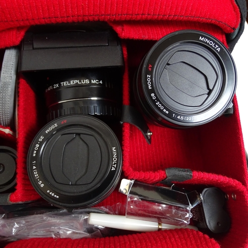 451 - A quantity of mixed cameras and equipment, including a Minolta zoom 35-88mm lens, a Minolta 80-200mm... 