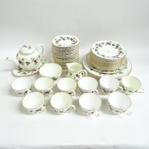 471 - Royal Worcester Bacchanal tea service for 10 people, including teapot, and matching dinner plates