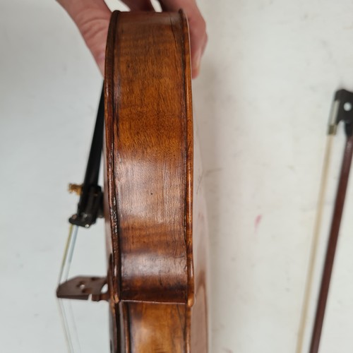 430 - A Vintage violin with a label for Joseph Guarnerius, 14