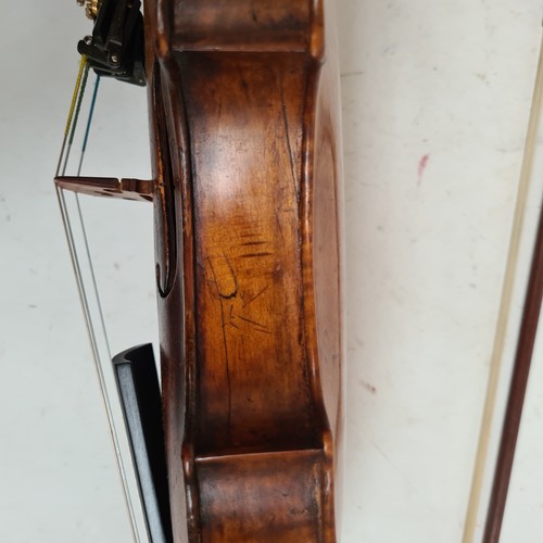 430 - A Vintage violin with a label for Joseph Guarnerius, 14