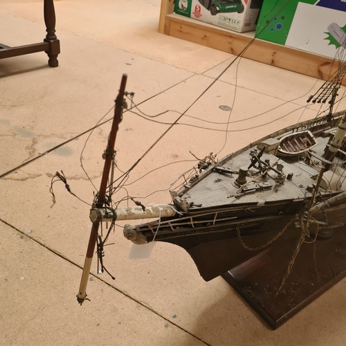 125 - A scratch-built riveted model of the Cutty Sark, with a box of associated accessories and spare part... 