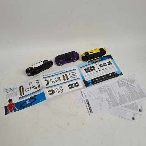 134 - SCALEXTRIC - a group of 3 boxed sets, including Pole Position Reve Up, Burn Off!, appears complete w... 