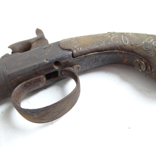 290 - An 18th century percussion pistol, engraved barrel and handle, not working, and a 19th century Middl... 