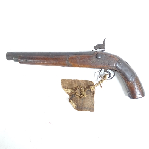 290 - An 18th century percussion pistol, engraved barrel and handle, not working, and a 19th century Middl... 