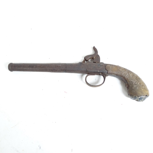 290 - An 18th century percussion pistol, engraved barrel and handle, not working, and a 19th century Middl... 