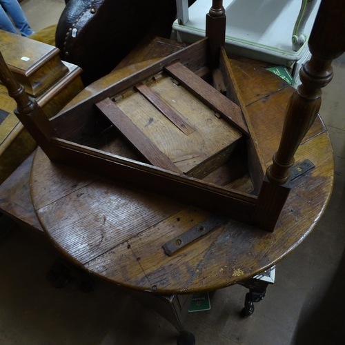 2051 - A 19th century oak circular topped cricket table with single frieze drawer. 75x62cm.