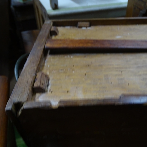 2051 - A 19th century oak circular topped cricket table with single frieze drawer. 75x62cm.