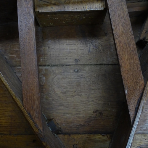 2051 - A 19th century oak circular topped cricket table with single frieze drawer. 75x62cm.