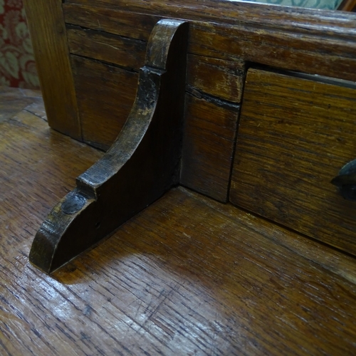 2051 - A 19th century oak circular topped cricket table with single frieze drawer. 75x62cm.