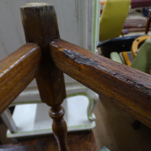 2051 - A 19th century oak circular topped cricket table with single frieze drawer. 75x62cm.