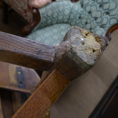 2051 - A 19th century oak circular topped cricket table with single frieze drawer. 75x62cm.