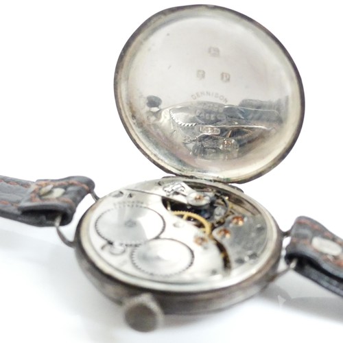 982 - WALTHAM - a silver cased half-hunter wristwatch, with blue enamelled Roman numerals and later strap